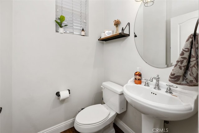 bathroom with sink and toilet