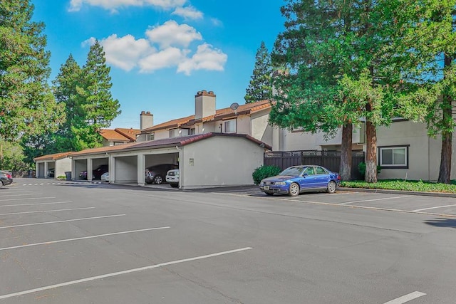 view of parking featuring a garage