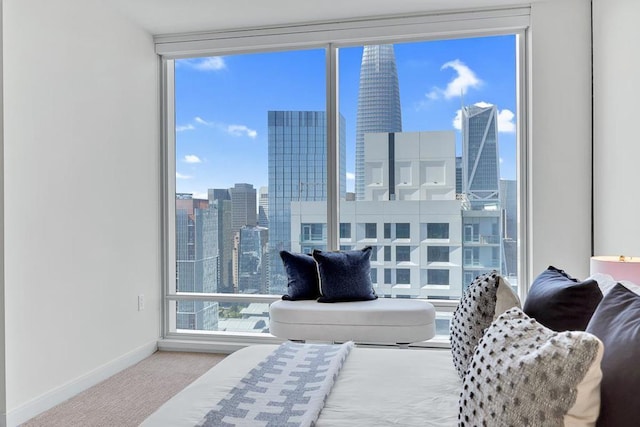 bedroom featuring light colored carpet