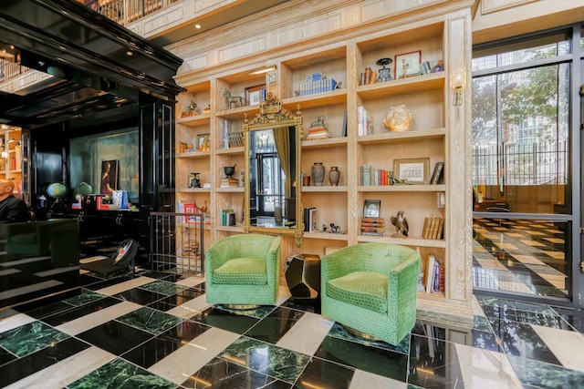 living area featuring built in shelves