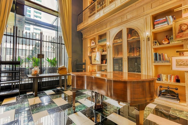 bar with built in shelves and wood walls