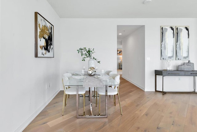 dining room featuring light hardwood / wood-style floors