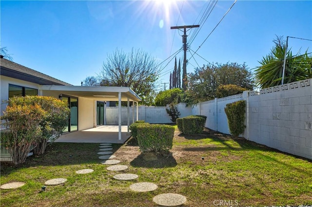 view of yard with a patio area