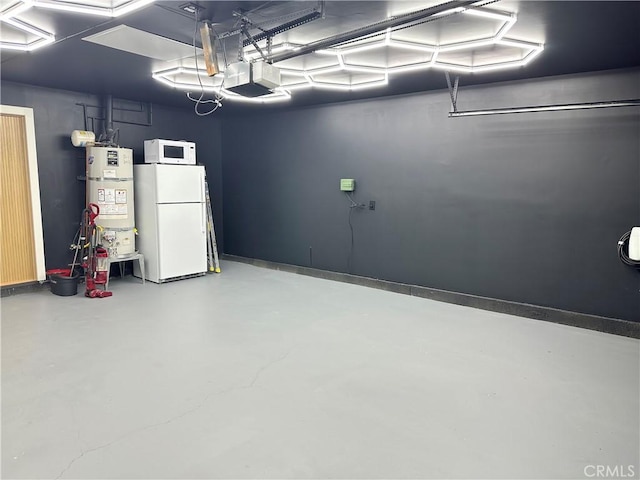 garage featuring secured water heater, a garage door opener, and white refrigerator