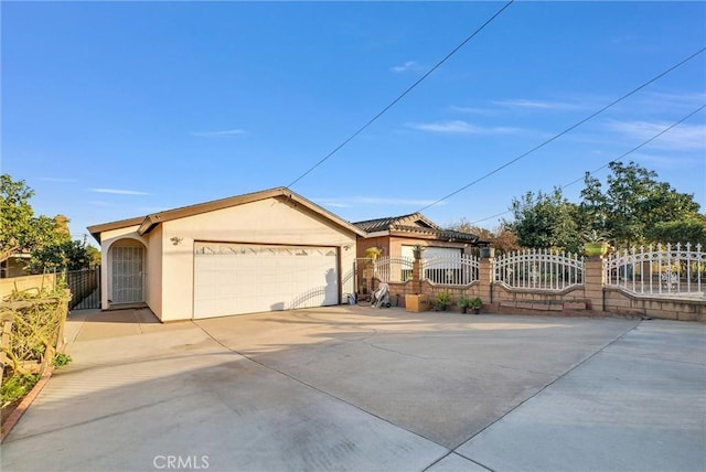 single story home featuring a garage