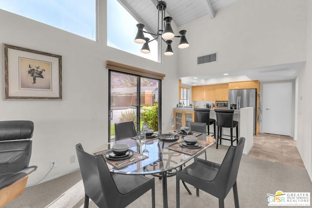 dining space with light colored carpet, high vaulted ceiling, an inviting chandelier, wooden ceiling, and beamed ceiling