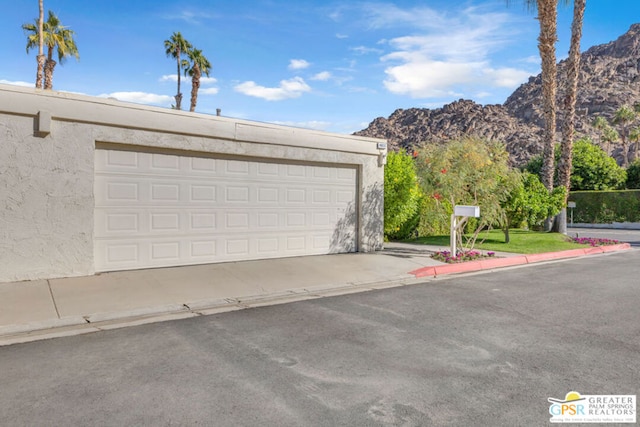 garage with a mountain view