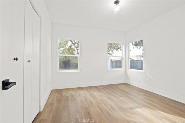 interior space featuring a closet and light wood-type flooring