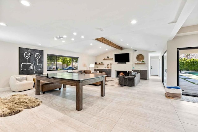 game room with lofted ceiling with beams