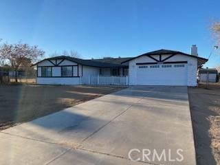 single story home featuring a garage