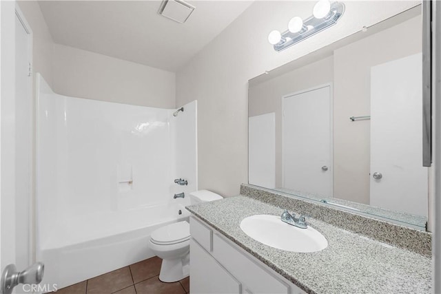 full bathroom with vanity, tub / shower combination, tile patterned floors, and toilet