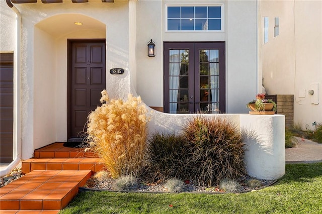 property entrance featuring french doors