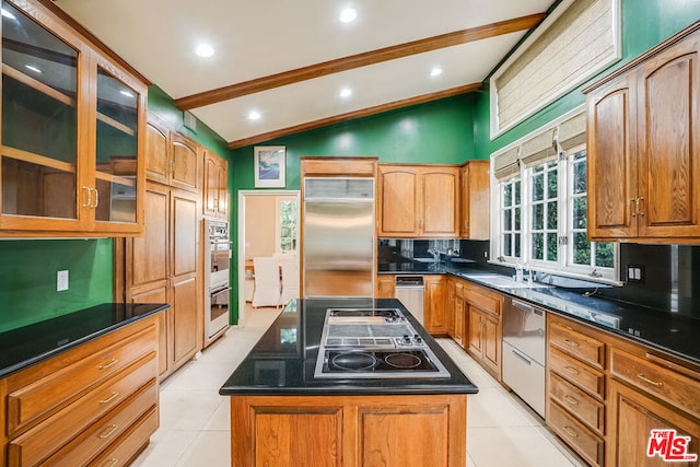 kitchen featuring appliances with stainless steel finishes, a center island, tasteful backsplash, and vaulted ceiling with beams