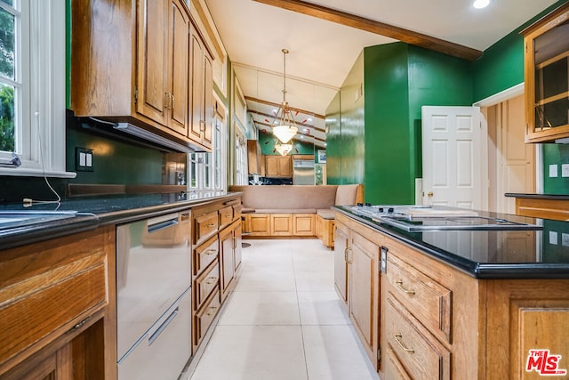 kitchen with decorative backsplash, light tile patterned floors, beam ceiling, a kitchen island, and hanging light fixtures