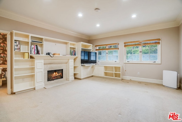 unfurnished living room featuring light carpet, a high end fireplace, and ornamental molding