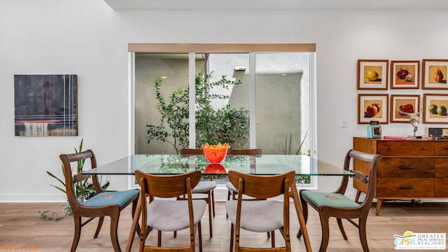 dining space featuring light hardwood / wood-style flooring