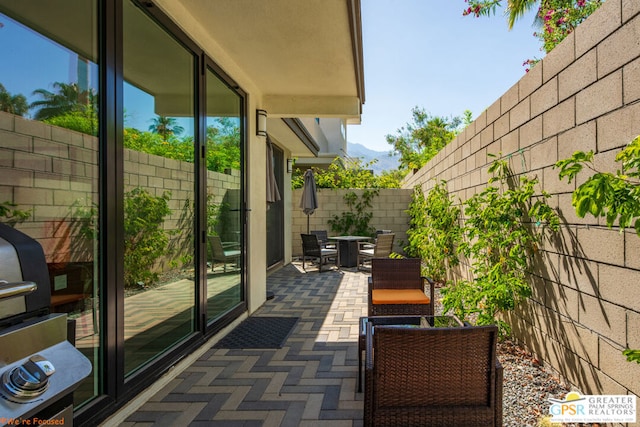 balcony featuring a patio