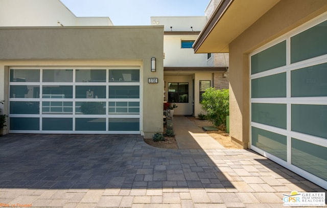 property entrance with a garage