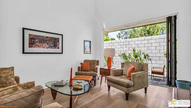 sitting room featuring light wood-type flooring