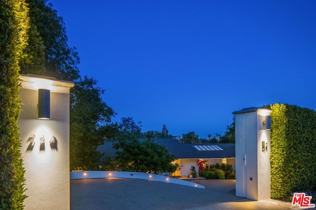 view of pool at night