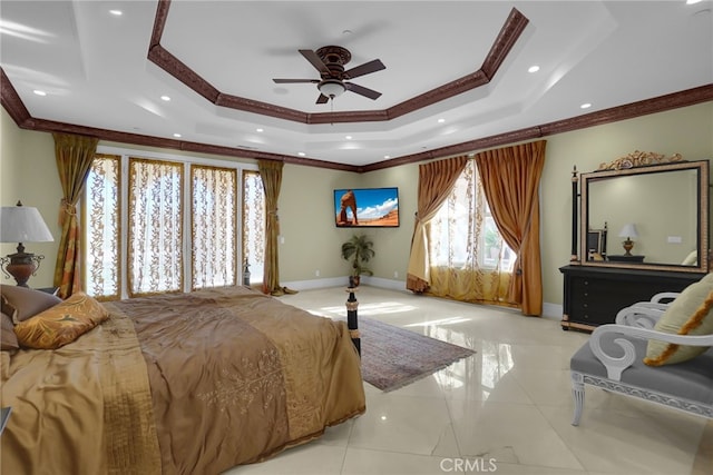 bedroom featuring light tile patterned floors, a tray ceiling, ceiling fan, and crown molding