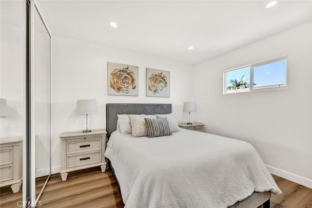 bedroom featuring hardwood / wood-style floors