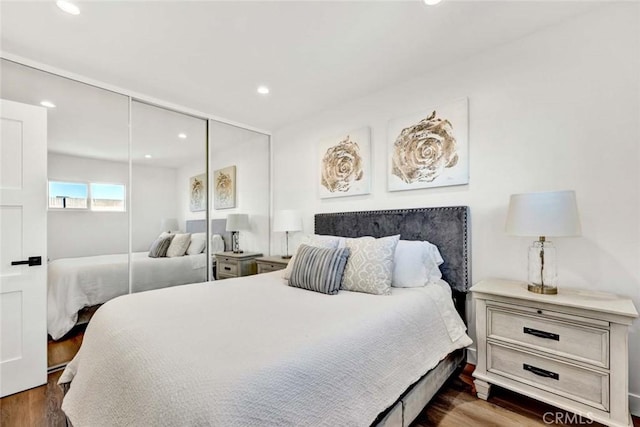 bedroom featuring dark hardwood / wood-style floors