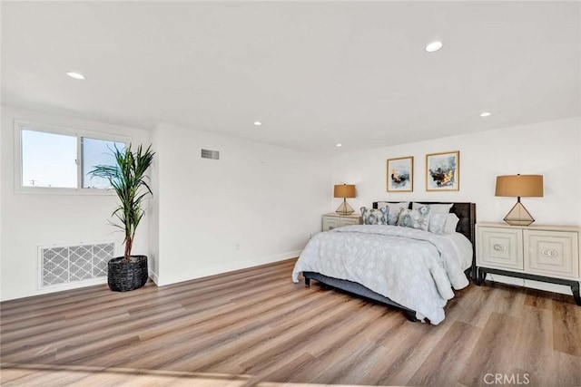 bedroom featuring hardwood / wood-style floors