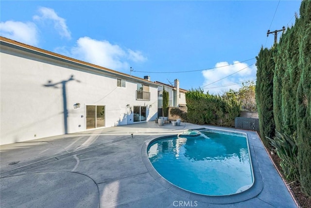 view of pool with a patio