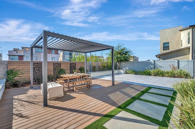 deck featuring a patio area and a pergola