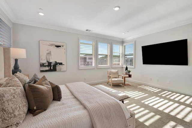 bedroom with light colored carpet and crown molding