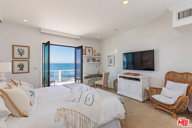 bedroom featuring light colored carpet, ornamental molding, and access to outside