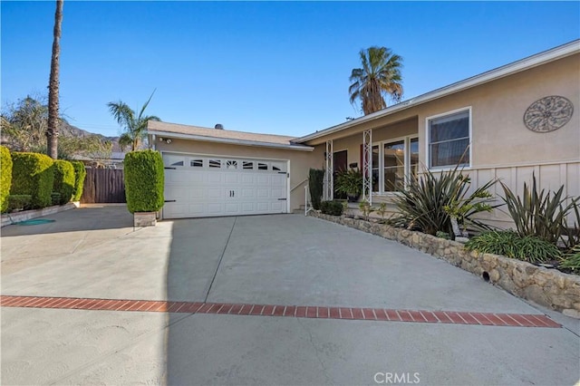 single story home with a garage