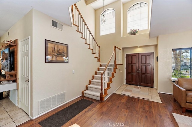 foyer entrance featuring wood-type flooring