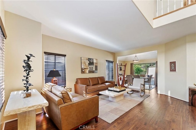 living area with dark wood-type flooring
