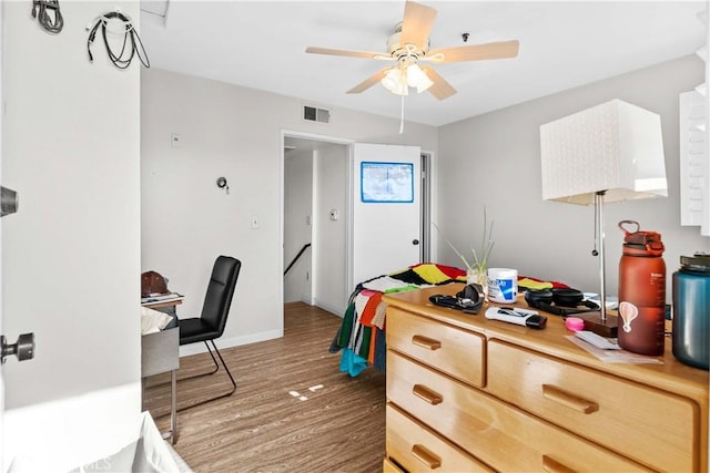 bedroom featuring hardwood / wood-style floors