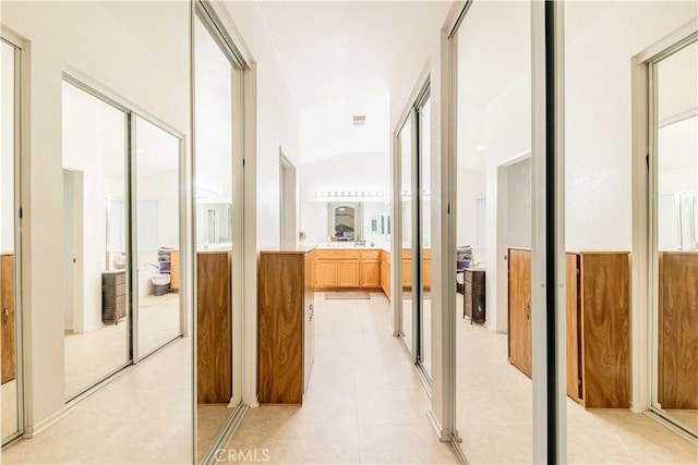 hallway with light tile patterned flooring