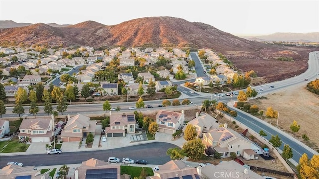 drone / aerial view featuring a mountain view