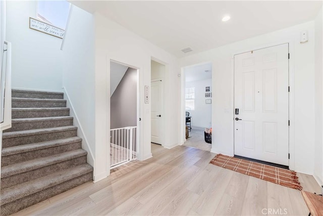 entrance foyer featuring light hardwood / wood-style floors