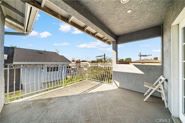 view of patio with a balcony