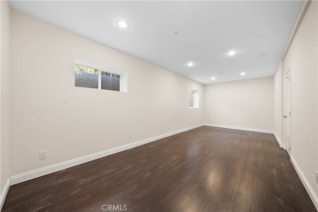 basement featuring dark hardwood / wood-style floors