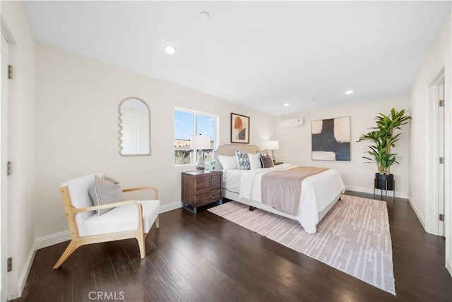 bedroom featuring dark hardwood / wood-style flooring