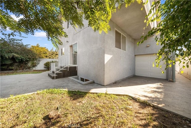 view of home's exterior featuring a garage