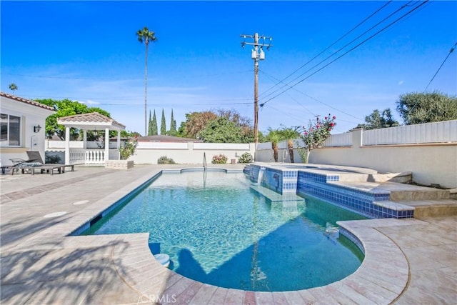 view of pool with a gazebo, a patio area, and an in ground hot tub