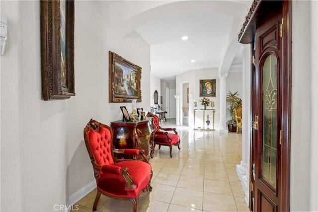 hallway with light tile patterned flooring