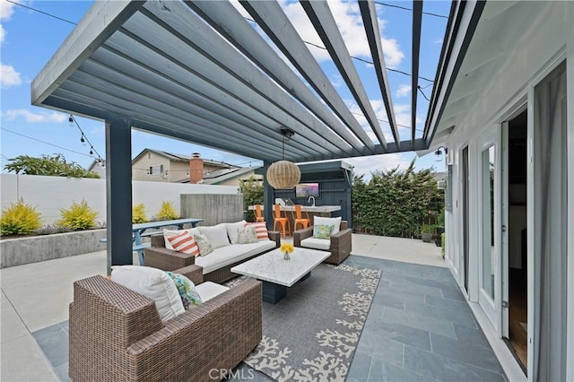 view of patio / terrace with a pergola and an outdoor living space