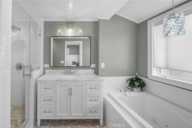 bathroom featuring vanity, crown molding, and plus walk in shower