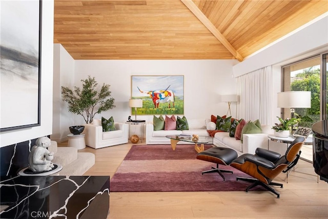 interior space with wood-type flooring, vaulted ceiling, and wood ceiling