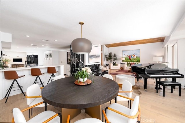 dining space featuring light hardwood / wood-style flooring