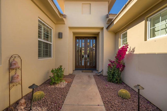 property entrance featuring french doors